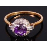 A yellow metal and platinum, amethyst and diamond cluster ring,