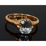 An 18ct gold aquamarine set dress ring, the claw set octagon set aquamarine, weighing approx. 1.