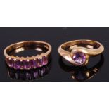 A modern 9ct gold and amethyst set dress ring having a centre round cut amethyst, size K,