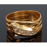 An 18ct gold diamond set snake ring, its head pave set with five graduated old cut diamonds,