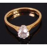 An 18ct gold diamond solitaire ring, the claw set brilliant weighing approx. 0.