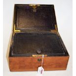 A circa 1900 leather clad writing slope,