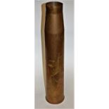 A large post WWII brass shell case dated 1967,