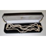 A Lotus Royale simulated pearl necklet,