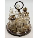 An early 20th century silver plated six bottle cruet stand