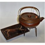 An early 20th century Japanese copper kettle of squat circular form,