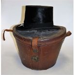 An early 20th century brushed velvet top hat bearing a label for CA Dunn & Co.