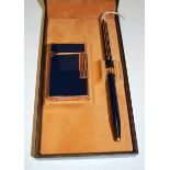 A Du Pont of Paris Chinese lacquered pocket cigarette lighter with matching ball pen in fitted case