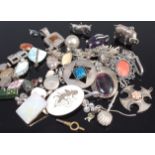 A quantity of principally silver and white metal, pendants, charms,