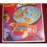 A boxed Matchbox Steer & Go magnetic racing set