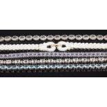 Five various modern silver and paste set bracelets,