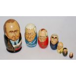 A graduated set Matryoshka dolls each depicting a Russian premier, the largest being Putin,