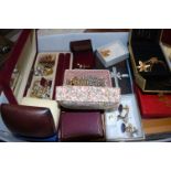 A box of assorted costume jewellery to include; gem-set rings, white metal necklace,