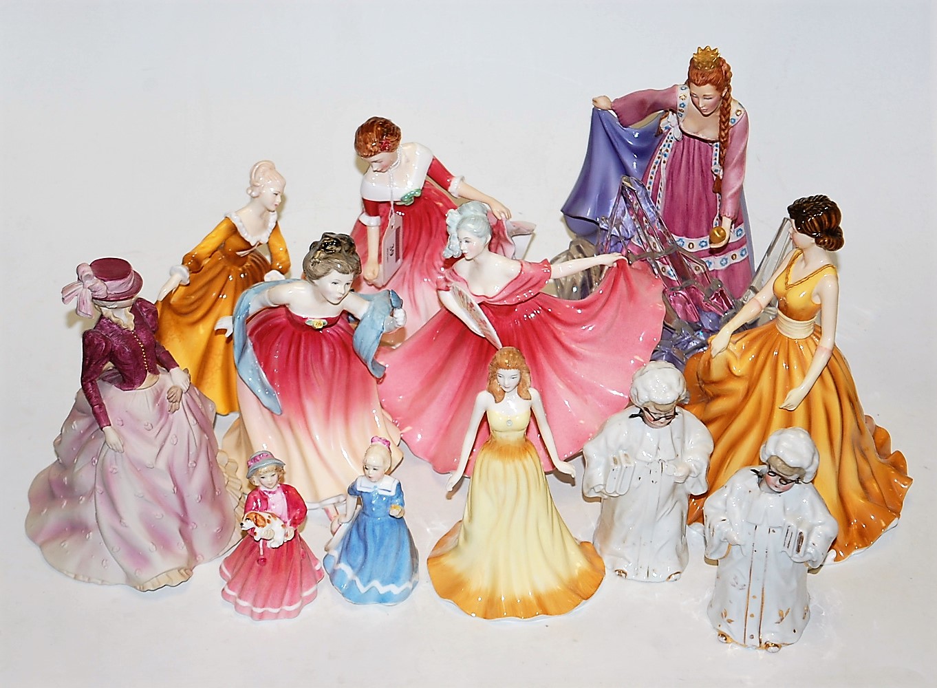 A collection of eight Royal Doulton figurines, to include Elaine HN3307, My Best Friend HN3011,