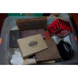 A box of miscellaneous items to include; boxed Strand Sharpener supreme safety razor,