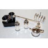 A George V silver four division toast rack by Viners;