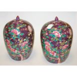 A pair of Chinese stoneware ginger jars and covers,