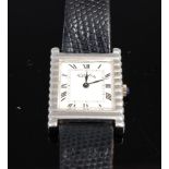 A contemporary Roy King silver dress watch having a signed white dial,