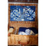 A wicker picnic hamper and contents,