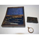 A Victorian rosewood cased draughtmens set; together with an Eastman Kodak Company camera;