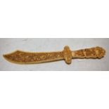 A Chinese Canton carved ivory paperknife in the form of a scimitar,