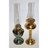 An early 20th century brass pedestal oil lamp (later converted for electricity);