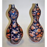 A pair of Japanese Meiji period Imari vases, each of double gourd form (a.f), h.