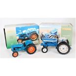 Universal Hobbies 1/16th scale boxed tractor group, both missing exhausts,