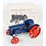 Malcs Models, England, model of a resin Fordson Major E27N, finished in dark blue with orange hubs,