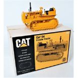 Gilson Riecke 1/16th scale white metal model of a CAT D4 Crawler Tractor, finished in CAT yellow,