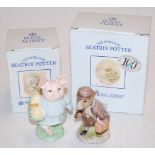 Two Royal Albert Beatrix Potter figures of Johnny Townmouse with a bag, and Little Pig Robinson,