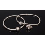 A Pandora silver bangle and bracelet,
