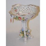 An early 20th century Dresden porcelain floral encrusted centrepiece, printed Dresden mark verso,