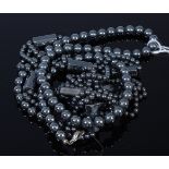 Two beaded haematite necklaces (one string a/f)