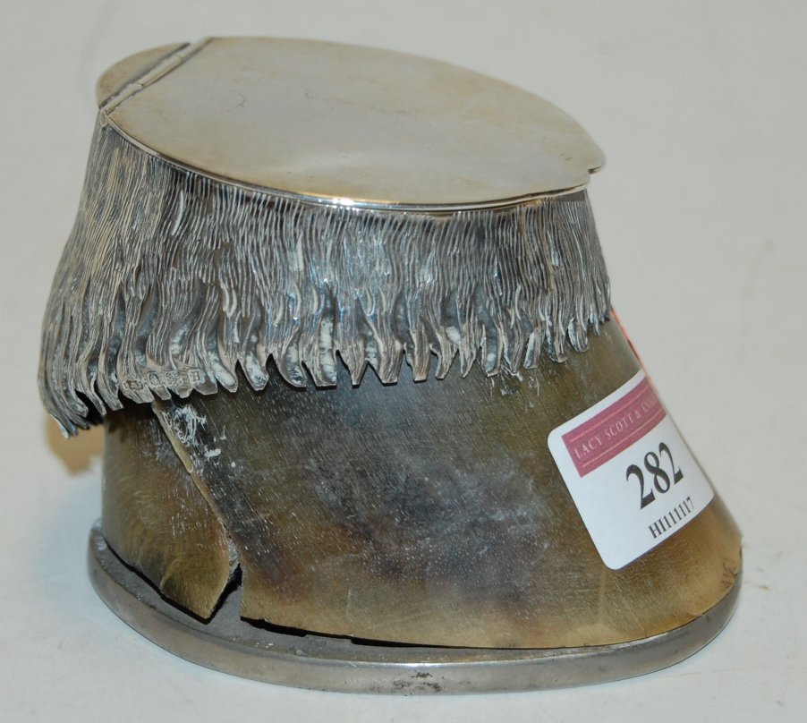 A circa 1900 silver mounted horseshoe inkwell (a/f)