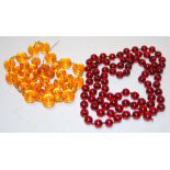 Two beaded faux amber necklaces