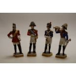 A set of four continental porcelain military figures,