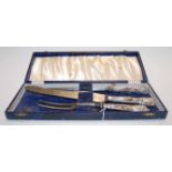 A late Victorian silver handled and steel three-piece carving set in fitted case
