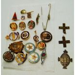 A collection of assorted enamelled and other lapel badges and brooches etc