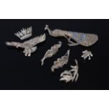 A quantity of marcasite set costume jewellery to include peacock brooch, leaf brooch, eagle brooch,