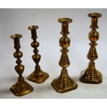 A pair of 19th century turned brass candlesticks, stamped England and numbered 223580, h.