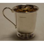 A modern silver christening mug, 2.