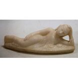 A carved alabaster figure of a reclining goddess, w.