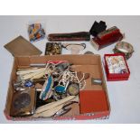 A collection of miscellaneous items, to include; pocket cigarette case, brass buttons,