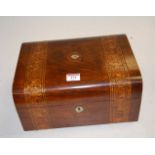 A Victorian walnut and Tunbridge decorated work box having a fitted interior