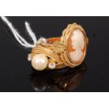 An 18ct gold and carved shell cameo ring together with a yellow metal cultured pearl and white
