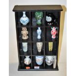 A collection of twelve Franklin Mint Treasures from the Imperial Dynasties porcelain vases,