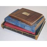 An early 19th century leather bound album containing various scraps, press cuttings and engravings,