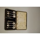 A cased set of six Roberts & Belk silver teaspoons with sugar bows,