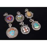 A quantity of silver and enamel sporting medals to include Aston Villa cup 1950,